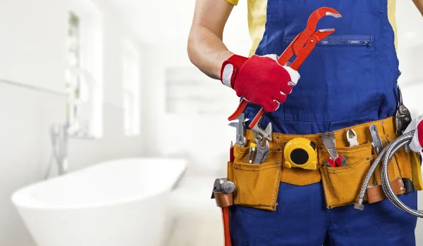 the torso of a plumbing technician showing a tool belt in Richardson, TX - Residential Plumbing Services the torso of a plumbing technician showing a tool belt in Richardson, TX - Residential Plumbing Services